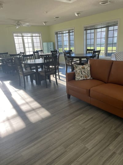 Bright common area with tables and seating