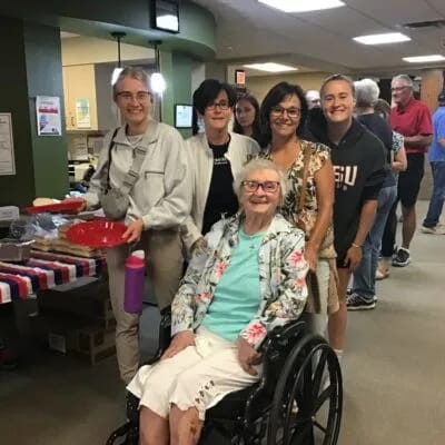 Residents and staff enjoying an activity together.