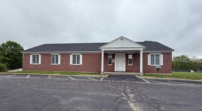 Exterior view of a single-story facility building.