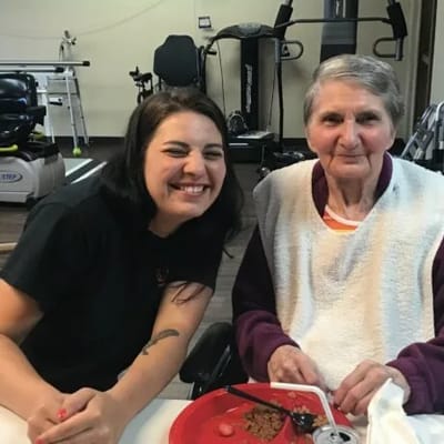 Resident and staff member enjoying time together