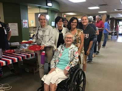 Staff and residents engaging in a community event.