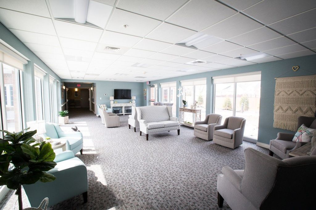 Bright common area with seating and windows.