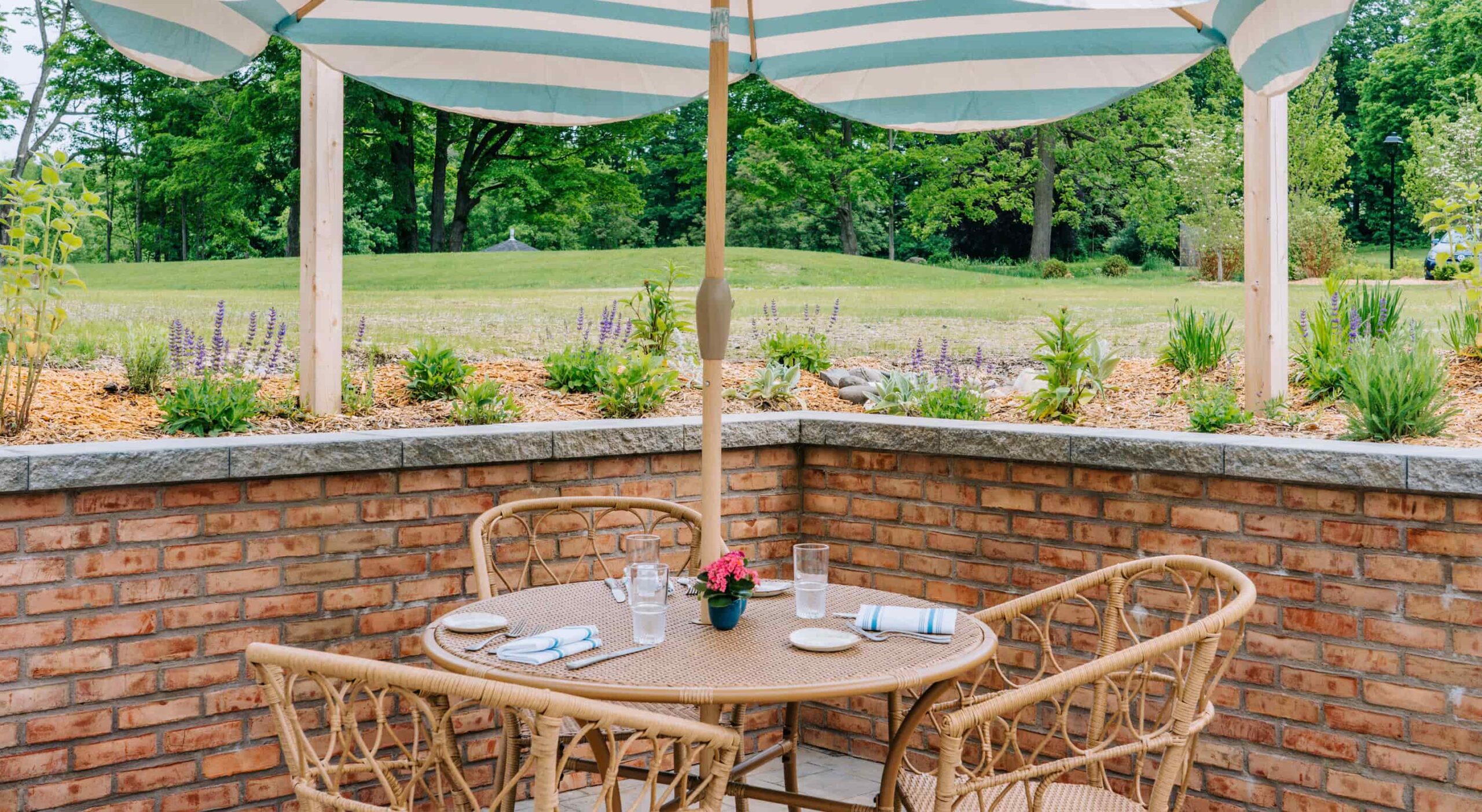 Outdoor dining area with a table and umbrella