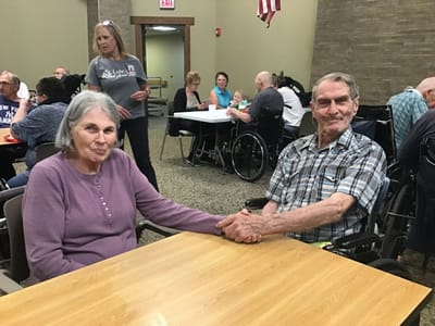 Residents engaging in a social activity.
