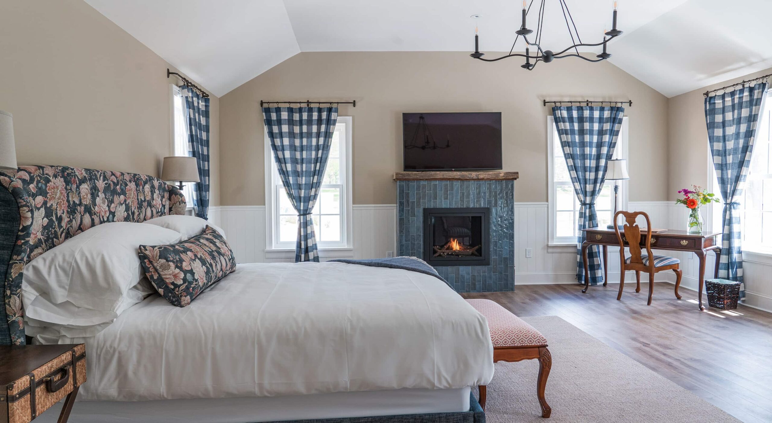 Cozy resident room with bed and fireplace