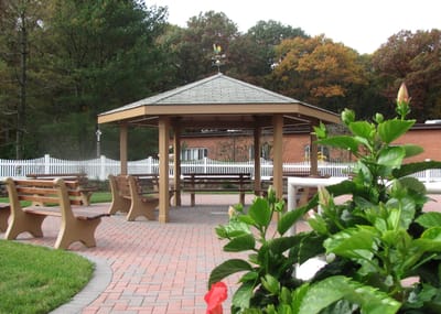 Outdoor gazebo in a landscaped area