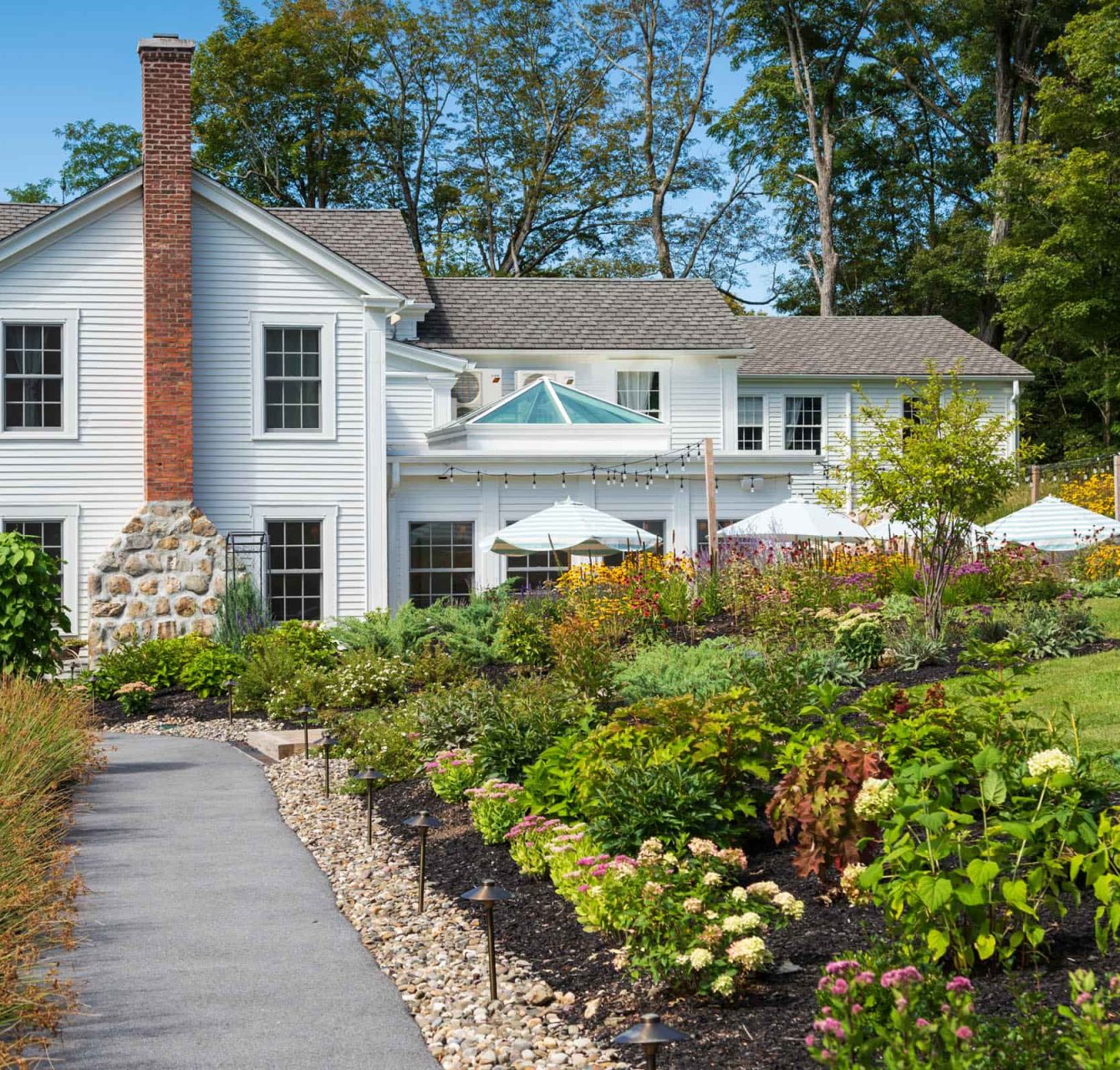 Exterior view of the facility with landscaped garden.