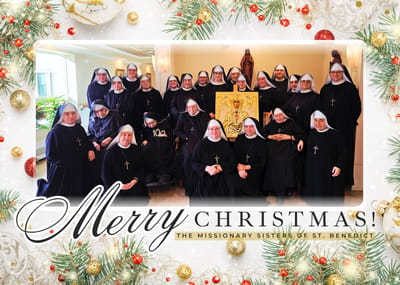 Group of nuns celebrating Christmas together.