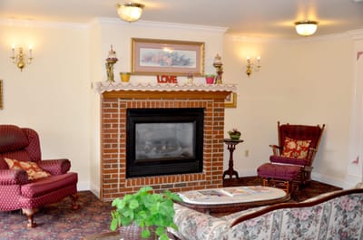 Cozy common area with a fireplace and seating