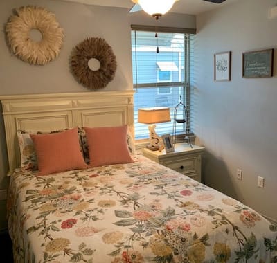Cozy resident bedroom with floral bedding