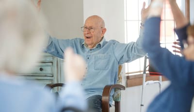 Engaged senior participating in a group activity