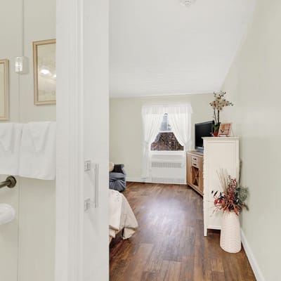 Comfortable resident room with warm decor
