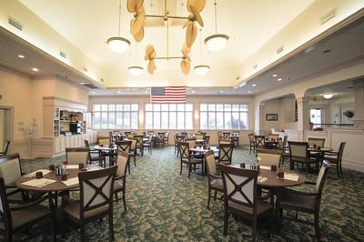 Dining area with tables and American flag