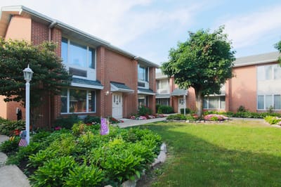 Well-maintained garden area with flowers and greenery.