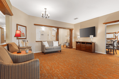 Comfortable common area with seating and a television