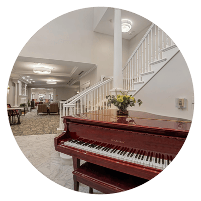 Interior view of the facility's common area with piano.
