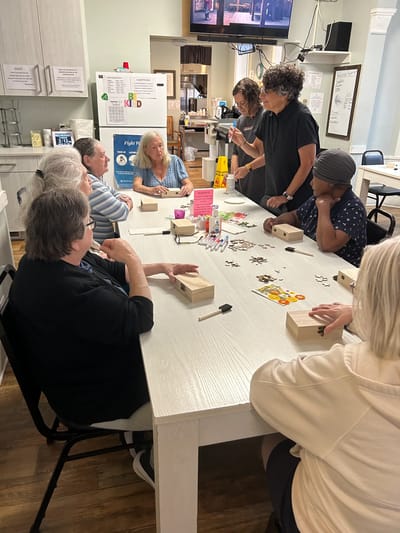 Residents engaging in an arts and crafts activity.