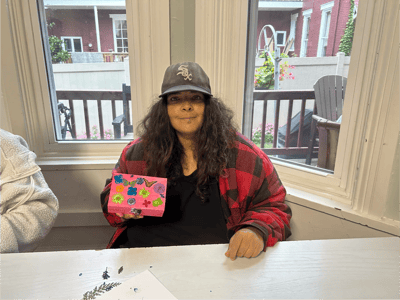 Resident participating in an art activity.