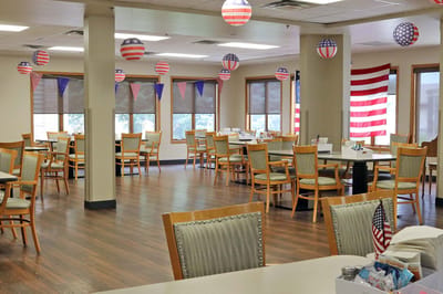 Dining area decorated with patriotic banners.