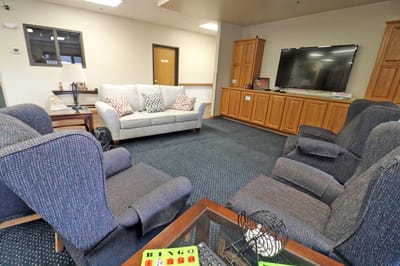 Common area with seating and television