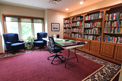 Cozy interior with bookshelves and seating