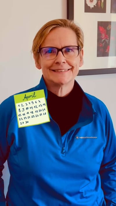 Staff member smiling for a photo