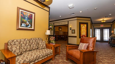 Cozy common area with seating and artwork