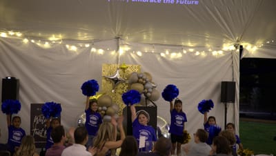 Children performing at a community event