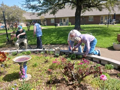 Residents gardening in the outdoor space