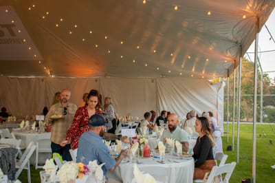 Residents enjoying a festive outdoor dining event.