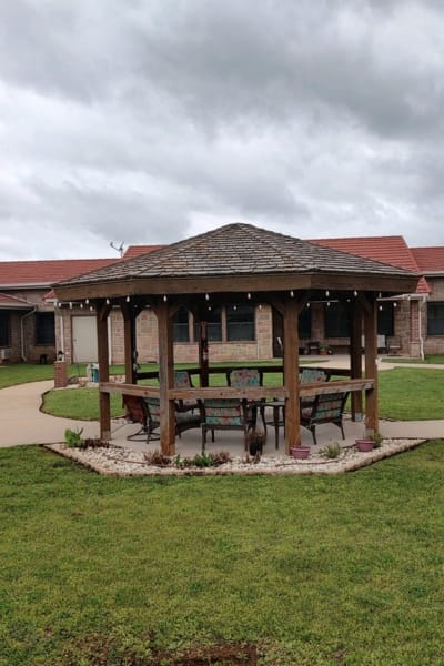 Outdoor gazebo area with seating