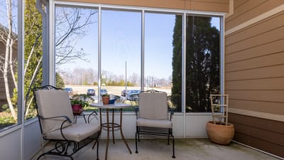Outdoor seating area with chairs and a table