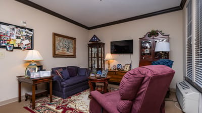 Cozy common area with seating and decorations.