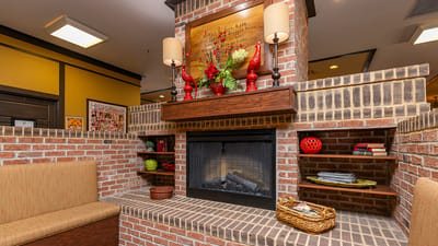 Cozy common area with a fireplace and seating