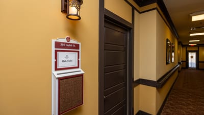 Interior hallway with room signage