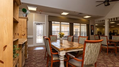 Bright common area with table and chairs