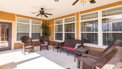 Outdoor seating area with wicker chairs