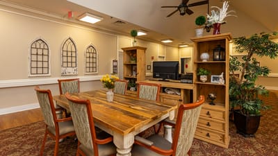 Common area with a wooden table and decor