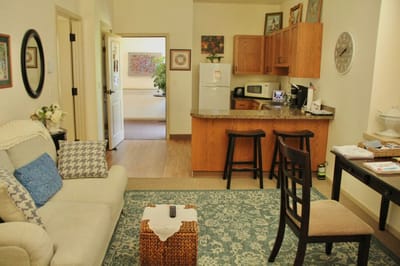 Cozy resident room with kitchen and sitting area