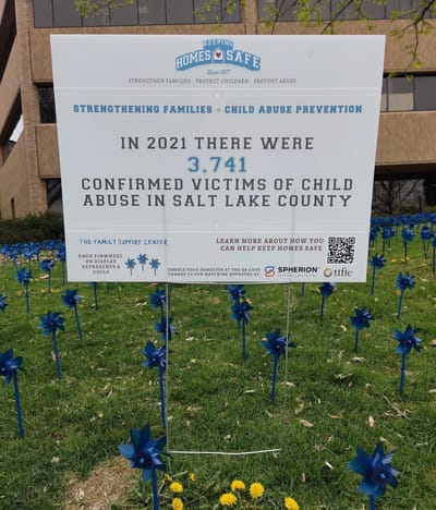 Outdoor sign about child abuse prevention