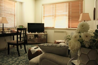 Cozy interior of a resident's room with decor.