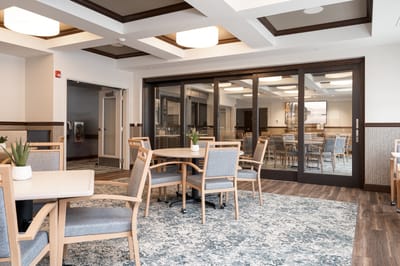 Bright interior common area with tables and chairs