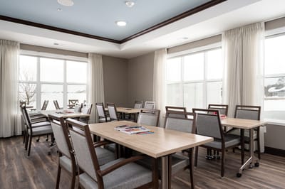 Interior common area with seating and tables.