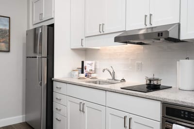 Bright kitchen area with modern appliances