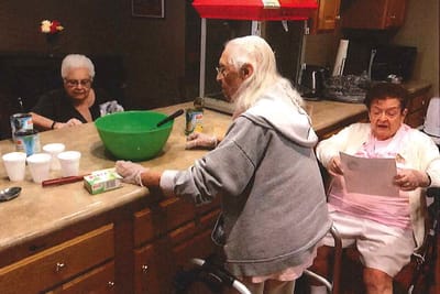 Residents engaged in a cooking activity