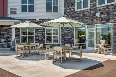 Outdoor seating area with umbrellas and flowers
