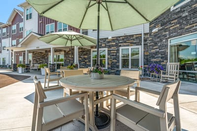 Outdoor seating area with umbrellas and flowers