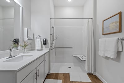 Accessible bathroom with modern amenities and decor.