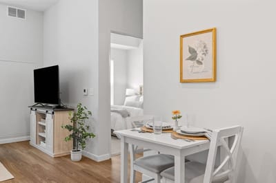 Cozy dining area in a senior living unit.