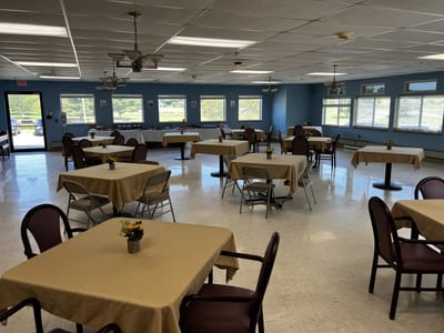 Dining area with tables and chairs set up